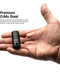 Hand holding a 9/16 shallow socket from Beefy Three Eighths Inch Drive Impact Socket Set With Shallow, Semi Deep And Deep Sockets, SAE Range From Five Sixteenths To One Inch, Thirty Six Piece Kit For Power Tools, Chrome Molybdenum Construction For Maximum Torque And Long Lasting Durability.