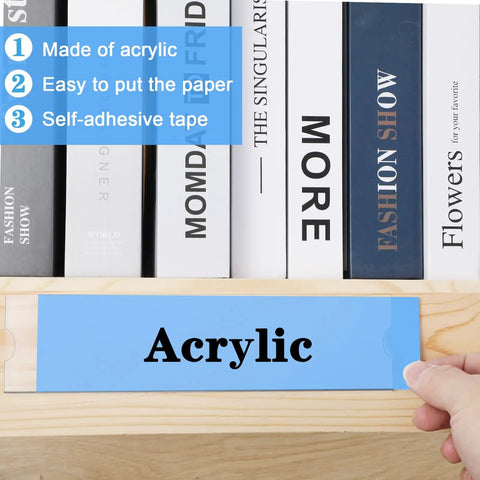 Person inserting paper into Clear 8 Inch Acrylic Name Plate Holder 2x8 Inch Wall Sign Display on wooden surface