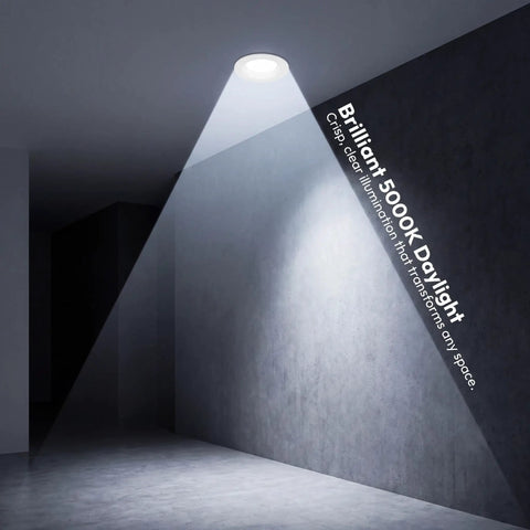 12 Pack 4 Inch Retrofit LED Recessed Lighting with E26 Adaptor, showcasing crisp white light on a textured wall.