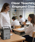 Teacher using 60W Bluetooth Karaoke Speaker And Wireless PA System With Dual Microphones in classroom setting