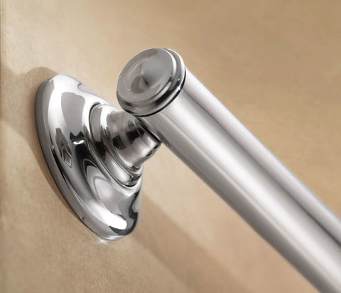 Close-up of a 16 Inch Chrome Bathroom Grab Bar With Comfort Grip Pad mounted on a wall, highlighting no-slip stability features.