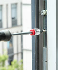Impact Screwdriver Bits Set 217 Pieces All In One S2 Steel With Magnetic Bit Holder in use on metal hardware outdoors