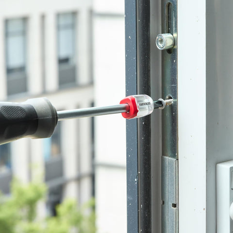 Impact Screwdriver Bits Set 217 Pieces All In One S2 Steel With Magnetic Bit Holder in use on metal hardware outdoors