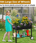 Raised Garden Bed On Wheels With Legs 31 Inch Elevated Outdoor Planter Cart For Vegetables Flowers Tomatoes Herbs Ergonomic Design Movable Garden Bed With Heavy Duty Handle Black in outdoor garden setting