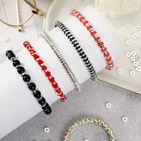 Assorted bracelets showcasing six millimeter flat round spacer beads pack of 1500 silver rondelle beads for jewelry making.