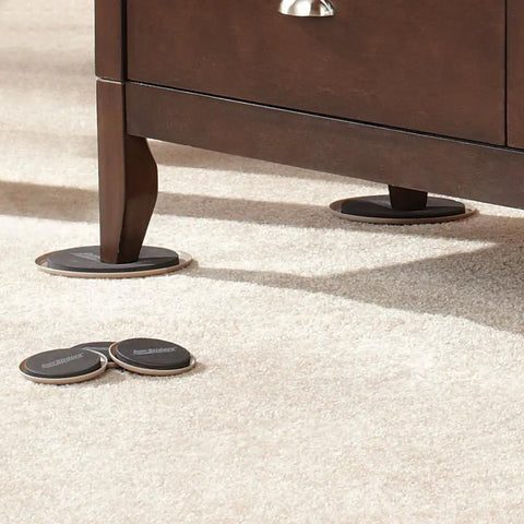 8-Piece Carpet Furniture Sliders Set For Easy Moving Of Beds, Sofas, Dressers And Heavy Furniture, shown under a dresser leg on carpet.