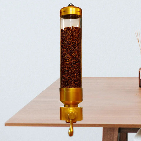 Straight Up Premium Coffee Bean Storage Canister Keeping Beans Extra Crisp In A Top Shelf Gold Tube Jar For Whole Grains And Snacks Kitchen Pantry Display Jar on a table with coffee beans visible inside.