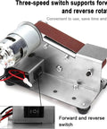 High Performance Mini Electric Belt Sander With Variable Speed Control and Reverse Switch showing motor and switch for easy rotation.