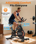 Man using Magnetic Indoor Exercise Bike With Exclusive App, adjustable seat and handlebars, for home studio cycling.