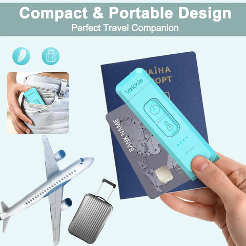 Compact blue USB device with controls, held by hand next to a passport and credit card, highlighting portable travel-friendly design.
