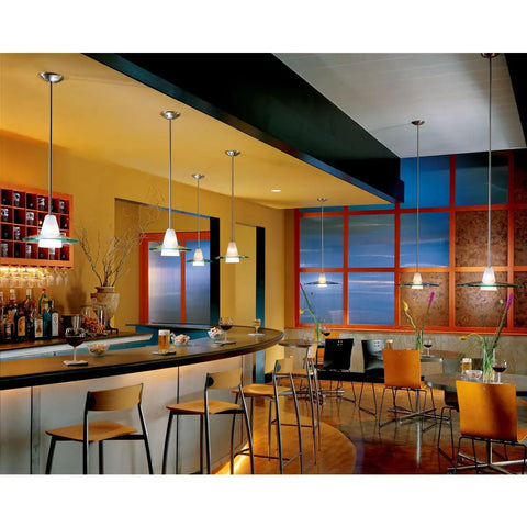 Sleek Modern Glass Pendant Light 1 Light With Brushed Nickel Finish illuminating contemporary dining area
