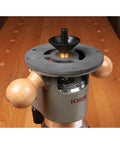 Heavy Duty CNC Milled Acetal Resin Router Baseplate Designed For Bosch 1617 Fixed Base Workshop Rigs featuring wood handles and black dust port.
