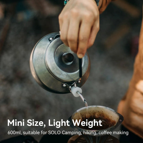 Lightweight 0.6 Liter Stainless Steel Camping Kettle With Locking Anti Hot Handle pouring over coffee filter
