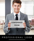 Man holding Custom Office Sign And Name Plate For Doors Or Walls, Indoor Outdoor Use, Horizontal Style, 18 Color Options, 9 Font Styles