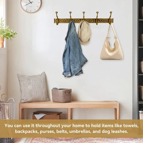 Space Saving Wall Mount Coat Rack With 5 Hooks And Key Holder in use, holding jacket and hat in a cozy entryway setting