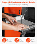 Person using 9 Inch Benchtop Woodworking Band Saw With 0.5 HP Motor for beast mode cuts up to 3.5 inches on cast aluminum table.