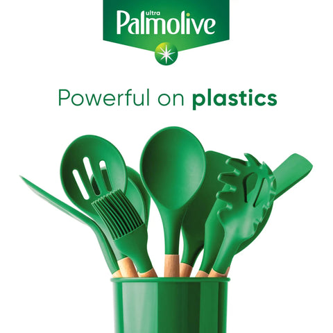 Set of green kitchen utensils in holder with Palmolive branding, highlighting effectiveness of Heavy Duty Dish Soap With Oxy Power Degreaser for plastic surfaces.