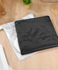 Tough As Nails EV Charger Station Cover Waterproof Rainproof Dustproof Universal Fit black cover laid out on wooden surface.
