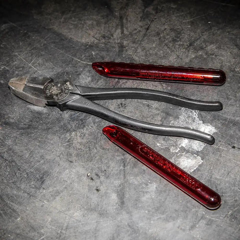 Replacement Plastic Handles For 8 To 9 Inch Pliers, Slip Resistant Ergonomic Grip, Made In USA, shown on workbench with pliers