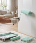 Person painting a wall with Wide Nap 14 Inch Paint Roller Covers That Roll Smooth As Silk With Zero Paint Drip Nonsense.
