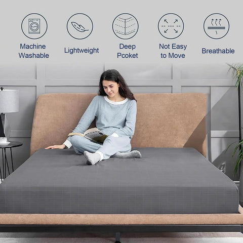 Woman sitting on bed with Grounding Fitted Sheet Queen Size With Cord For Deep Pocket Sleep Health And Earth Energy Game Changer Gray 60x80x14