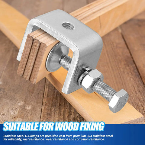 Heavy Duty 4pc C Clamp Set With Adjustable Knobs For Woodworking And Welding Tables Industrial Strength Grip, stainless steel clamp holding wood.