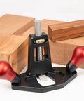 Tough As Nails Handheld Router Plane Featuring Adjustable Stainless Steel And Ebony Blades showing durable aluminum base and red handles.