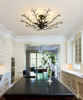 Vintage Crystal Chandelier Five Light Semi Flush Mount Ceiling Light in black illuminating a modern kitchen with white cabinets.
