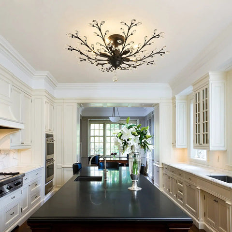 Vintage Crystal Chandelier Five Light Semi Flush Mount Ceiling Light in black illuminating a modern kitchen with white cabinets.