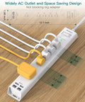 Two Pack Heavy Duty Surge Protector Power Strip With Six Foot Extension Cord Five Wide Spaced Outlets And Four Usb Charging Ports For A Hassle Free Tech Setup That Actually Holds Up on a wooden surface.