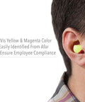 Person wearing Laser Lite High Visibility Disposable Foam Earplugs with Self-Adjusting Fit, NRR 32 Noise Reduction, Vibrant Yellow Color