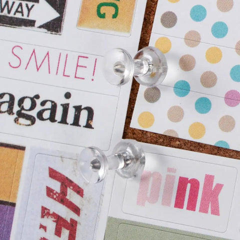 Legit Durable Push Pins 600 Count Standard Thumb Tacks With Kickass Steel Points And Clear Rounded Tops used on corkboard for colorful notes.