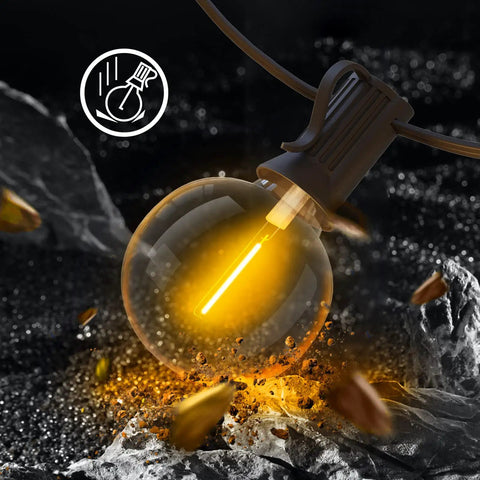 Close-up of a glowing G40 bulb from 50Ft Outdoor String Lights With 48 Dimmable G40 LED Bulbs Shatterproof UL Listed Waterproof Globe Lights