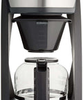 Front view of Heat N Brew 10 Cup Programmable Coffee Maker with stainless steel finish and Even Brew showerhead for even extraction.