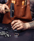 Crafting with Heavy Duty Chicago Screws And Leather Rivets Kit, 120 Pieces Rock Solid Hardware, using tools on leather.