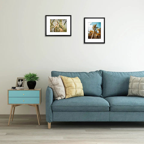 Living room with 16x20 Picture Frame With Mat For 11x14 Photo Black 2 Pack HD Glass Wall Mounted Above Blue Sofa