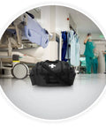 Deluxe EMS Trauma Bag For First Responders With Eight Pockets And Removable Organizer Pro Grade Heavy Duty Polyester PVC Coated Medical Kit Carryall Measures 22 Inches By 11 Inches By 11.5 Inches Black in hospital setting