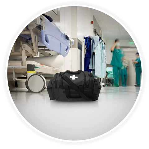 Deluxe EMS Trauma Bag For First Responders With Eight Pockets And Removable Organizer Pro Grade Heavy Duty Polyester PVC Coated Medical Kit Carryall Measures 22 Inches By 11 Inches By 11.5 Inches Black in hospital setting