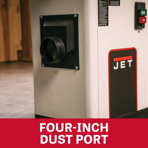 Close-up of a four-inch dust port on a JET woodworking machine, highlighting its durable black plastic construction.