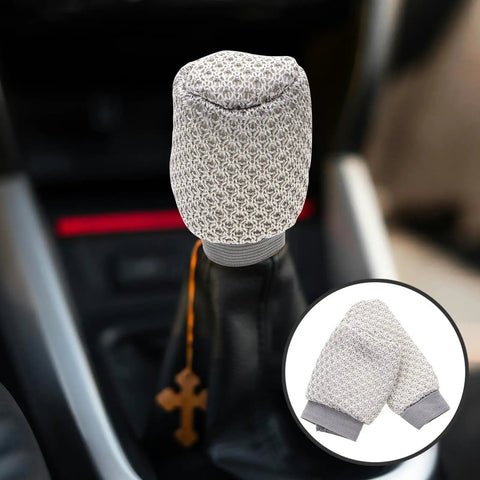 Get That Fresh And Breezy Fit With This Super Durable Gear Shift Knob Cover Kit Plus Breathable Brake Handle Grip Sleeve Made For Ultimate Comfort And Long lasting Style In Your Ride. Gray knitted gear shift knob cover and brake handle grip sleeve on car lever