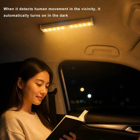 Pack Of Three Motion Activated Rv Step Lights With 10 Bright Leds And Instant Trigger Easy Peasy Install Cordless Battery Powered Magnetic Night Light Strip For Camper Trailer Motorhome Solid Warm Glow illuminating a woman reading in a car at night.
