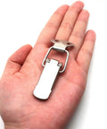 Stainless Steel Spring Loaded Toggle Latch Set For Cabinets, Toolboxes, Drawers, Boxes, And Chests, held on hand, compact size