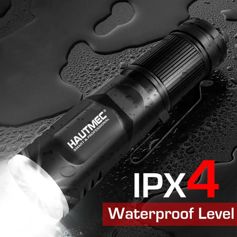 Rechargeable LED Flashlight With 500 Lumens Magnetic Base Waterproof Build Three Modes High Low Strobe Compact Handheld Light shown on wet surface highlighting waterproof feature.