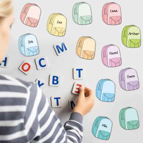 Child arranging 36 Piece Magnetic Name Tags Dry Erase Labels In 12 Colors Schoolbag Shaped on a board with letters.