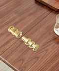 Premium Brass Table Leaf Dowel Pins And Extension Table Connectors on wood table, showcasing heavy-duty solid alignment sleeves.