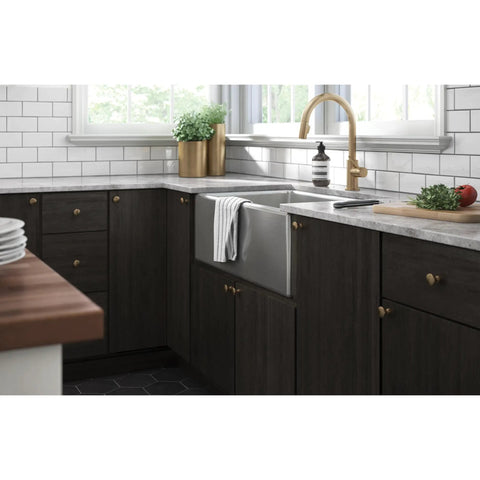 Champagne Bronze Cabinet Knobs Set Ten Pack One And A Quarter Inch Round Mushroom Pulls For Cabinets Drawers Kitchen Doors Vanities And Furniture Upgrade Your Home With Dope Hardware shown on dark wood kitchen cabinets.