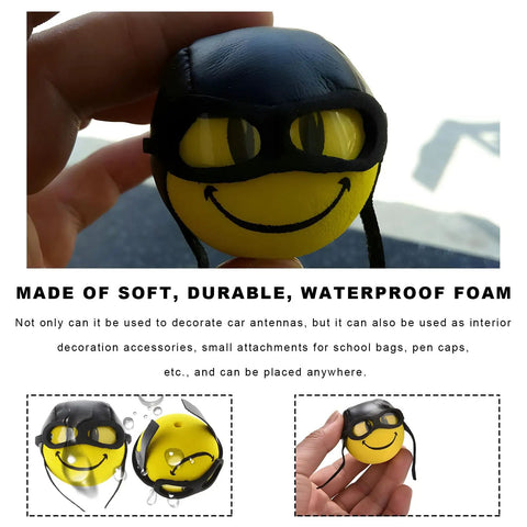 Funny Pilot Antenna Topper Ball For Cars EVA Foam Exterior Decoration held in hand, showing durable yellow foam pilot character.