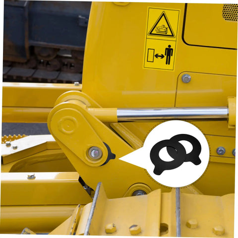Heavy Duty Round Rubber Washers For Excavator Boom Bushing Replacement Heavy Duty Shock Pads, shown near excavator linkage.