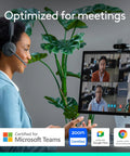 Woman in headset using Epic 4K HD Webcam With Autofocus And Five X Digital Zoom Built Straight For Streamers And Remote Pros Featuring Rightlight 3 Auto Exposure Fix And Nailed Color Balance For Hella Crisp Video Calls for virtual meetings.