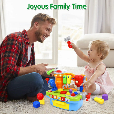 Father and toddler playing with Musical Toddler Tool Bench Set For One Year Olds, Montessori Educational Play Kit.